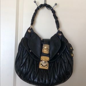 Miu Miu Coffer satchel